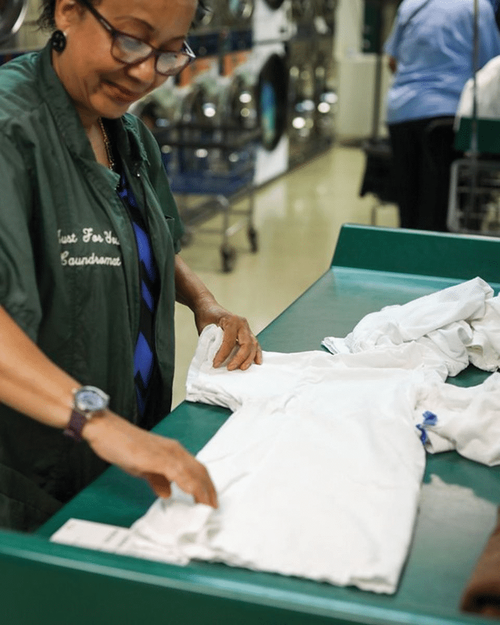 woman-folding-alundry